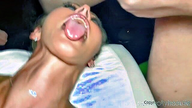 Hot blonde MILF Holly enjoys a wild gangbang with strangers, leading to a messy bukkake finale.