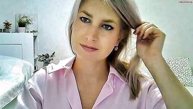 In this tantalizing image, the alluring Sarahphelps, a seasoned model, captivates with her sensual charisma in a private video stream.