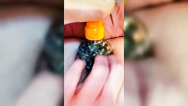 british milf stuffs her pussy with marbles and stretches her clit : Milf
