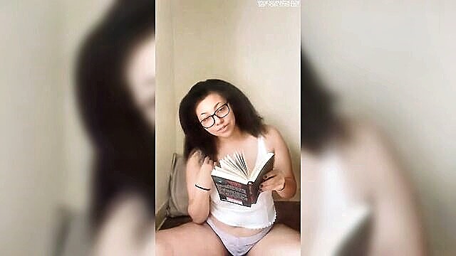 Kink - nerdy girl with glasses gets turned on by erotica Kink