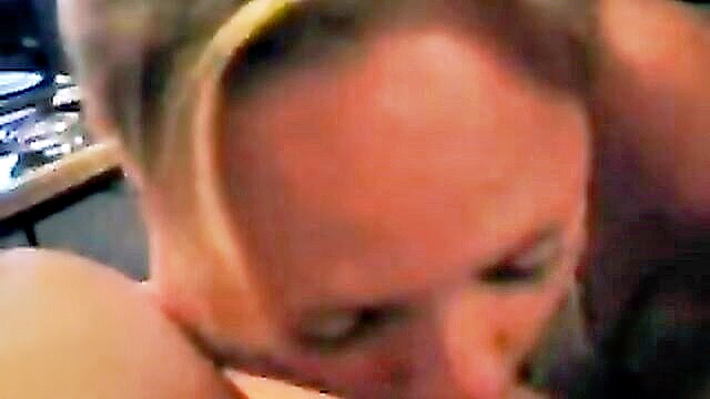 In this amateur video, a girl passionately gives a blowjob in the comfort of her home, eagerly taking in every bit of her partner\'s pleasure.