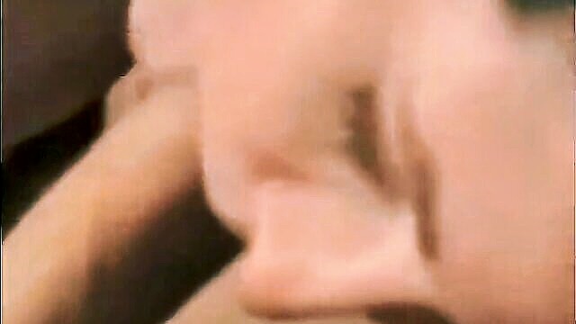 A busty middle-aged woman with a noticeable bulge in her pants meets a tattooed stranger for a steamy encounter in this sneak peek.