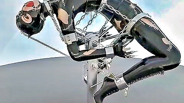 Kink - latex clad catwoman in bondage with toys and restraints Kink
