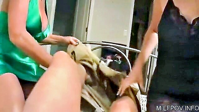 In this steamy clip, a busty MILF feeds her son and curvy Aunt in a sensual POV scene, complete with lactating moments and tit-sucking.