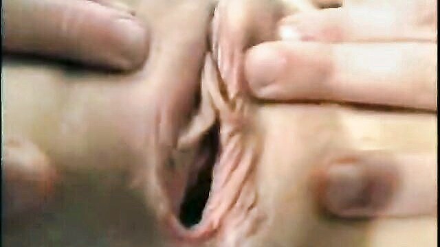 close up of a teen spreading her shaved pussy in a solo xxx porn video : ama