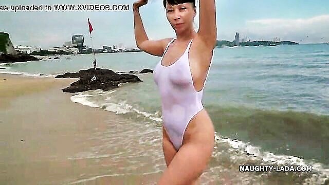 sexy milf flaunts wet see through swimsuit at the beach in xxx video full hd : Sheer