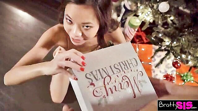 In this holiday-themed video, a naughty stepbro receives a special gift from her brother. Watch as she indulges in intense cowgirl action and a mind-blowing deepthroat in POV.