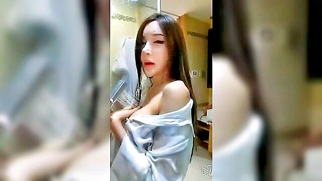 busty chinese model miss wang showcases her assets at sexxxxcom : Kink