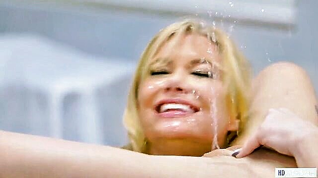 Sensual video preview features a blonde MILF lesbian doctor exploring a shy 18-year-old\'s desires, leading to intense squirting.