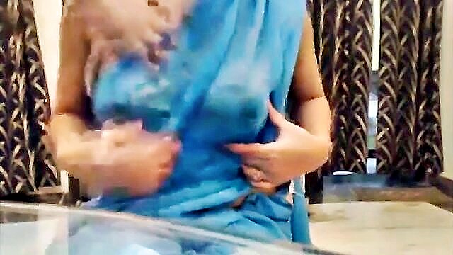 Seductive Indian aunty engages in steamy encounters with her intimate friends in an erotic video featuring explicit scenes and ample display of her voluptuous derriere.