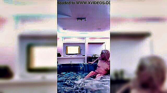 Alina, a stunning blonde, indulges in a luxurious bath, her seductive charm on display in this captivating full xxx preview.