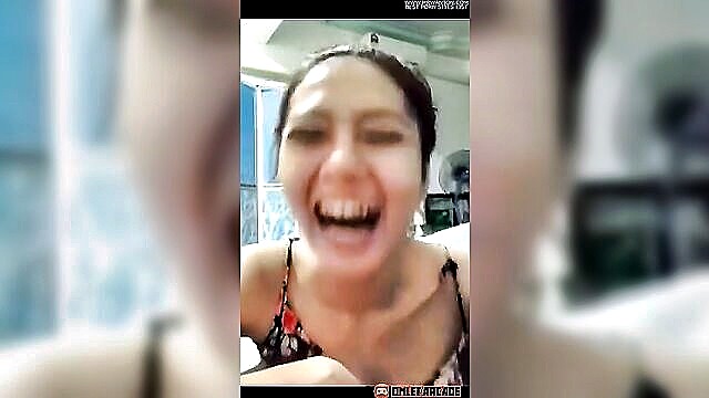 Sexy Malaysian teen with big nipples seductively poses on webcam in tantalizing video.