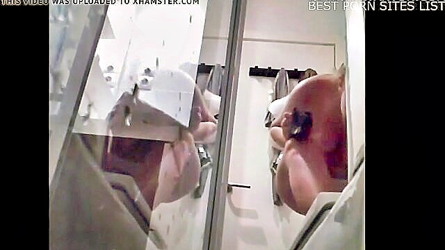 Hidden camera captures a stunning amateur blonde showering seductively. Her hot ass on display in the steamy video.