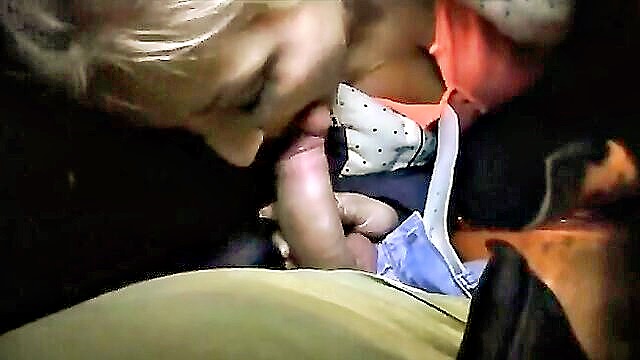 Busty blonde seduces couple in fake taxi with titfuck and oral sex, culminating in cum shot.