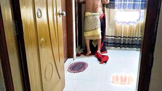 In this image, an Indian aunty in a seductive saree and bra is getting tied by her neighbor, leading to an exciting encounter.