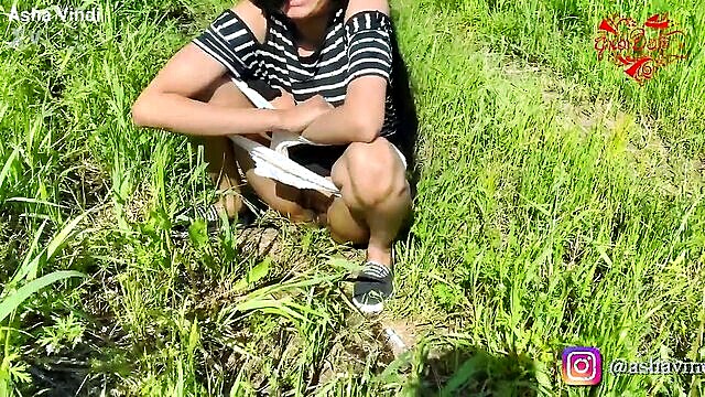 desi babe pisses outdoors in seductive display : Asha Vindi