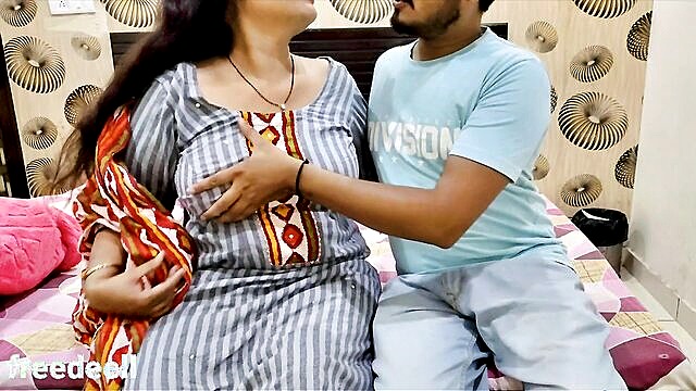 Indian dude gets down and dirty with his best friend\'s smoking hot step mom on camera in a fresh new xxx porn video with Hindi audio.