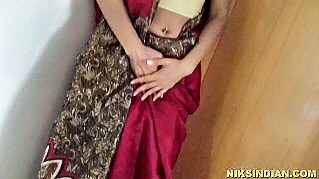 In this explicit video, an Indian man eagerly swallows a MILF maid\'s urine before engaging in passionate sex with her.