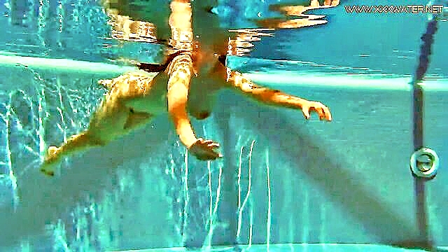 Sheril - watch big breasted sheril submerge in water unclothed for a sensual experience dixie_shanahan