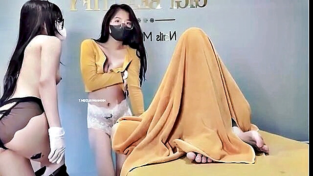 asian, masturbation, lesbian - two seductive sirens reveal their intimate delights beside a lucky spectator