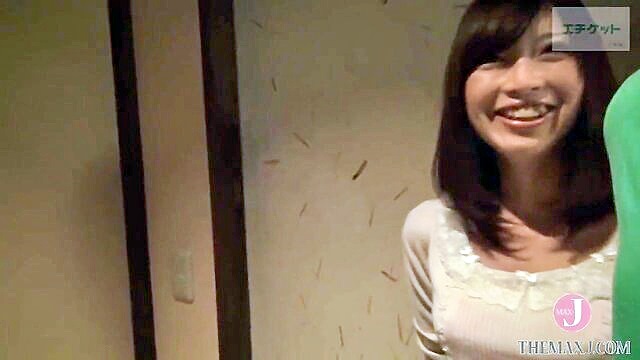 Seductive Asian babe enjoys a wild ride in reverse cowgirl, skillfully pleasuring her partner\'s massive shaft, leading to an explosive climax.