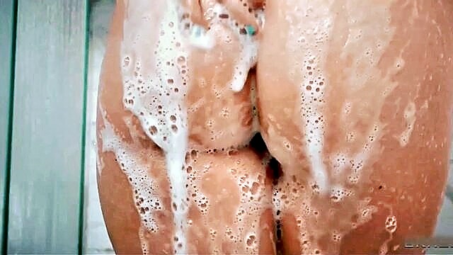 big tits and big ass in a steamy shower session : We