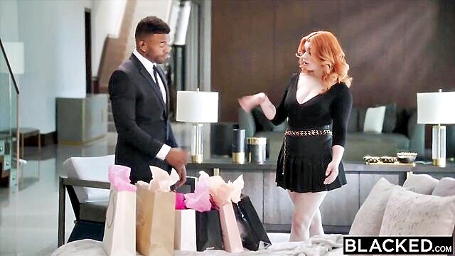 Redhead beauty indulges in a big black cock, getting her fill of XXX porno pleasure.