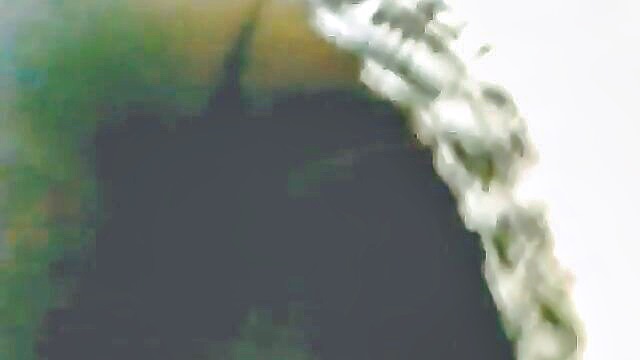 Spycam captures a Latin milf\'s tantalizing upskirt ass view at work, showcasing her alluring booty. Xxx vidio.