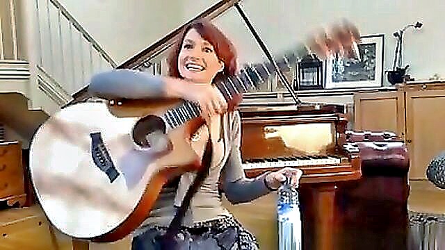 redheads sensual performance with guitar and exposed cleavage on www xxx videos : agnes_gislason